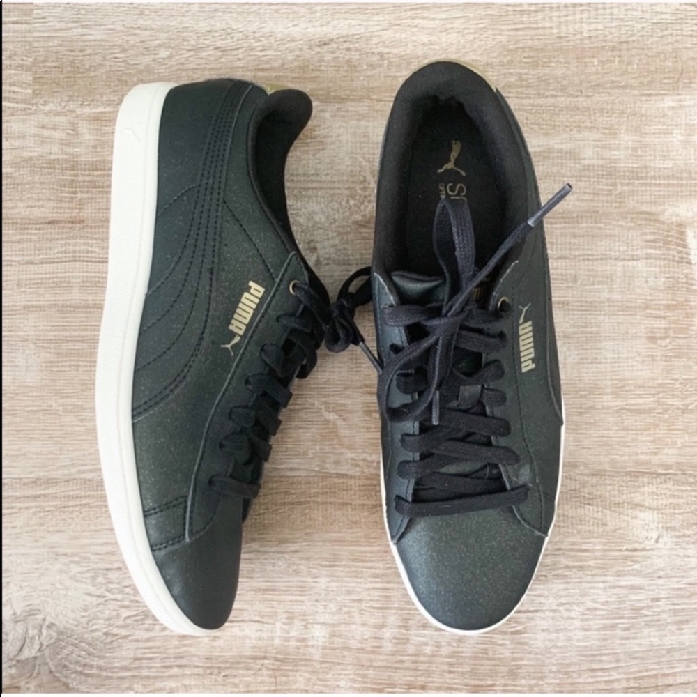 Puma Black and Gold Round Toe Sneaker